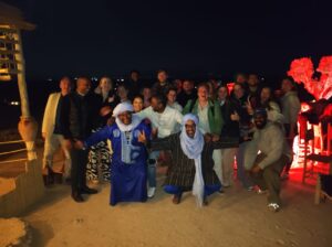 Agafay Desert Weddings
An Agafay Desert wedding is the pinnacle of bohemian luxury, offering a profound alternative to traditional venues. We specialize in crafting deeply personal ceremonies where the stark, beautiful landscape and the majestic Atlas Mountains form a natural cathedral. Our expertise ensures every detail is perfected, from the construction of elegant ceremony arches adorned with native flora to the arrangement of long, feasting tables draped in rich linens and illuminated by the soft glow of a hundred Moroccan lanterns. We coordinate with the finest local chefs to create a sumptuous feast, perhaps featuring a Mechoui, and seamlessly integrate captivating entertainment like Gnawa musicians and fiery performances, all under a blanket of stars. This is not just a wedding; it's an immersive, unforgettable experience that reflects a couple's unique spirit, orchestrated with the flawless execution that comes from our years of dedicated experience.

Honeymoons in the Agafay Desert
For newlyweds seeking a sanctuary of serenity and romance after their celebration, the Agafay Desert provides an idyllic honeymoon retreat. We curate intimate journeys focused on connection and luxury, securing private tents at exclusive camps that feature en-suite bathrooms, personal plunge pools, and secluded decks for unparalleled stargazing. Our services include arranging iconic experiences such as a private, candlelit dinner for two on a secluded dune, complete with a dedicated butler, or organizing a sunrise hot air balloon flight that offers a breathtaking aerial view of the desert awakening. By blending adventurous daytime excursions like camel treks with restorative couples' spa treatments, we create a perfectly balanced honeymoon that offers both seclusion and accessibility, ensuring a truly restorative start to a couple's new life together.

Dinner Parties & Special Occasions
Hosting a dinner party in the Agafay Desert is an unparalleled way to celebrate any special occasion, transforming a simple meal into an enchanting journey. Leveraging our deep connections with the finest desert camps, we orchestrate evenings that begin with a scenic sunset drive and a warm welcome of mint tea and pastries. As dusk falls, your guests will be immersed in an atmosphere of magic, seated amidst Berber tents and cushions, with the desert night illuminated by flickering lanterns and a central fire pit. We manage every logistical detail, from the multi-course gourmet Moroccan menu to the ambient sounds of traditional musicians, ensuring you and your guests are free to relax and fully absorb the profound beauty and camaraderie of the evening. This is the essence of Moroccan hospitality, elevated by our expert planning.

Birthday Dinners
Elevate a birthday from a simple celebration to a legendary event with a personalized desert gathering. Our team excels at transforming the unique canvas of the Agafay into a bespoke party venue, whether it's for an intimate family dinner or a larger gathering of friends. We handle all customization, from arranging a private tent or dedicated dining area to coordinating special décor, a custom-made cake, and a tailored menu that delights the guest of honor. To amplify the excitement, we can seamlessly integrate surprise elements such as a dynamic drumming group or a mesmerizing fire show. By taking care of all transportation and logistics, we ensure the birthday person and their guests experience a seamless, joyful, and utterly memorable adventure.

Bachelorette & Bachelor Parties
Offer a sophisticated and unique alternative to the standard city celebration with an adventurous desert bash, expertly organized by our team. We design itineraries that blend exhilaration with luxury, beginning with high-energy activities like quad biking across the dramatic rocky plains. As the afternoon unfolds, we transition the party to a luxury camp for sunset cocktails by the pool, setting a chic and social tone for the evening. The celebration continues with a private, vibrant dinner under the stars, where we can arrange for premium drinks, music, and even a themed dress code. Our focus is on creating a fun, bonding experience that fosters lasting memories, all while ensuring the highest levels of safety, comfort, and exclusive service for the entire party.

Corporate Events & Retreats
The Agafay Desert provides a powerful and inspiring setting for corporate events, designed to break from convention and foster genuine team connection. We specialize in organizing off-site meetings, client appreciation events, and team-building retreats that leverage the transformative desert environment. Our services include structuring daytime activities that challenge and unite teams, followed by sophisticated evening gatherings that facilitate networking in a relaxed, breathtaking setting. By managing all aspects—from AV equipment for presentations to gourmet catering and themed entertainment—we remove all logistical burdens. This allows companies to achieve their strategic goals while offering participants an unforgettable experience that boosts morale and sparks innovation.

Gifting in the Agafay Context
Understanding that a thoughtful gift can elevate an already special experience, we advise on and can source a range of meaningful presents rooted in Moroccan culture. Beyond material items, we often recommend gifting an unforgettable experience, such as arranging a private camel trek at sunset or a soothing spa treatment for the honored guests. For tangible keepsakes, we suggest authentic, high-quality local crafts, such as exquisite Berber jewelry, luxurious Argan oil products, or a beautifully handcrafted lantern that will forever evoke the magic of a desert night. These gifts, curated through our trusted network of local artisans, serve as a lasting reminder of the celebration and the profound beauty of Morocco.